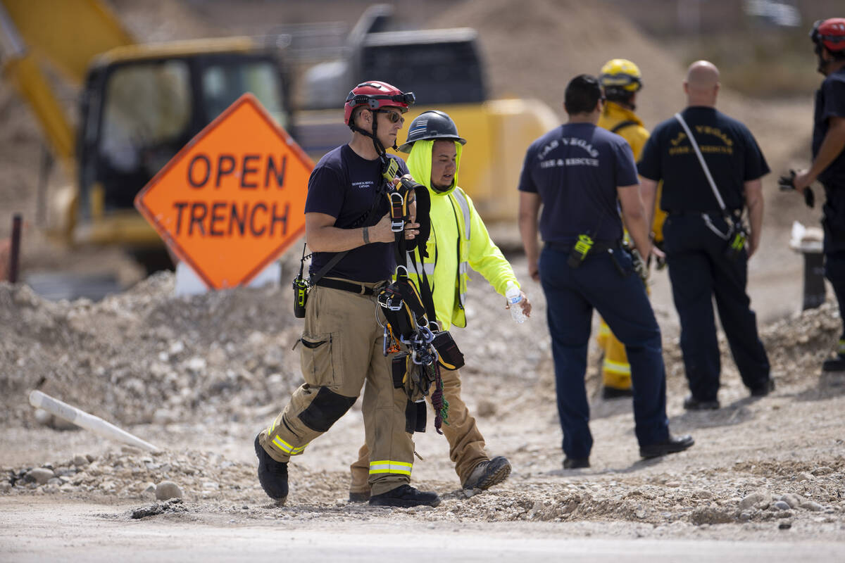 Las Vegas police and firefighters from various agencies respond to a workplace fatality at a co ...