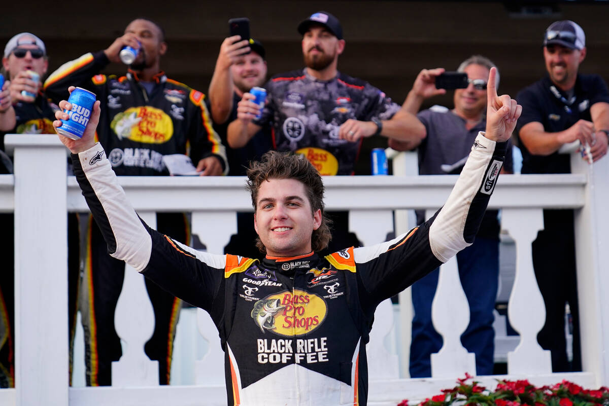 Noah Gragson celebrates after he won the NASCAR Xfinity Series auto race at Pocono Raceway, Sat ...