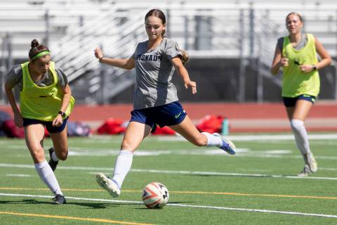 Trinity Buchanan takes a shot during a drill at Coronado High School's girls soccer practice on ...