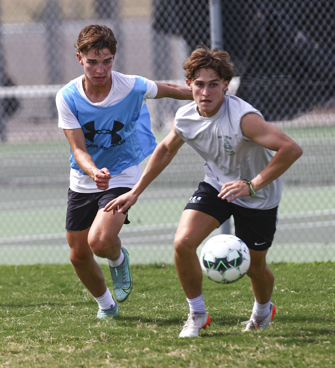 Palo Verde’s Matthew Vogel, second from right, chases after the ball in front of Dominic ...