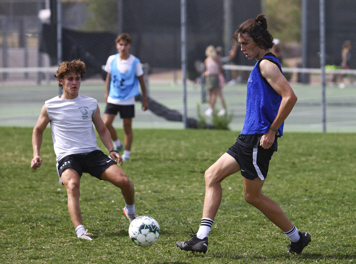 Palo Verde’s Quentin Gomez, right, tries to get the ball past Matthew Vogel during socce ...