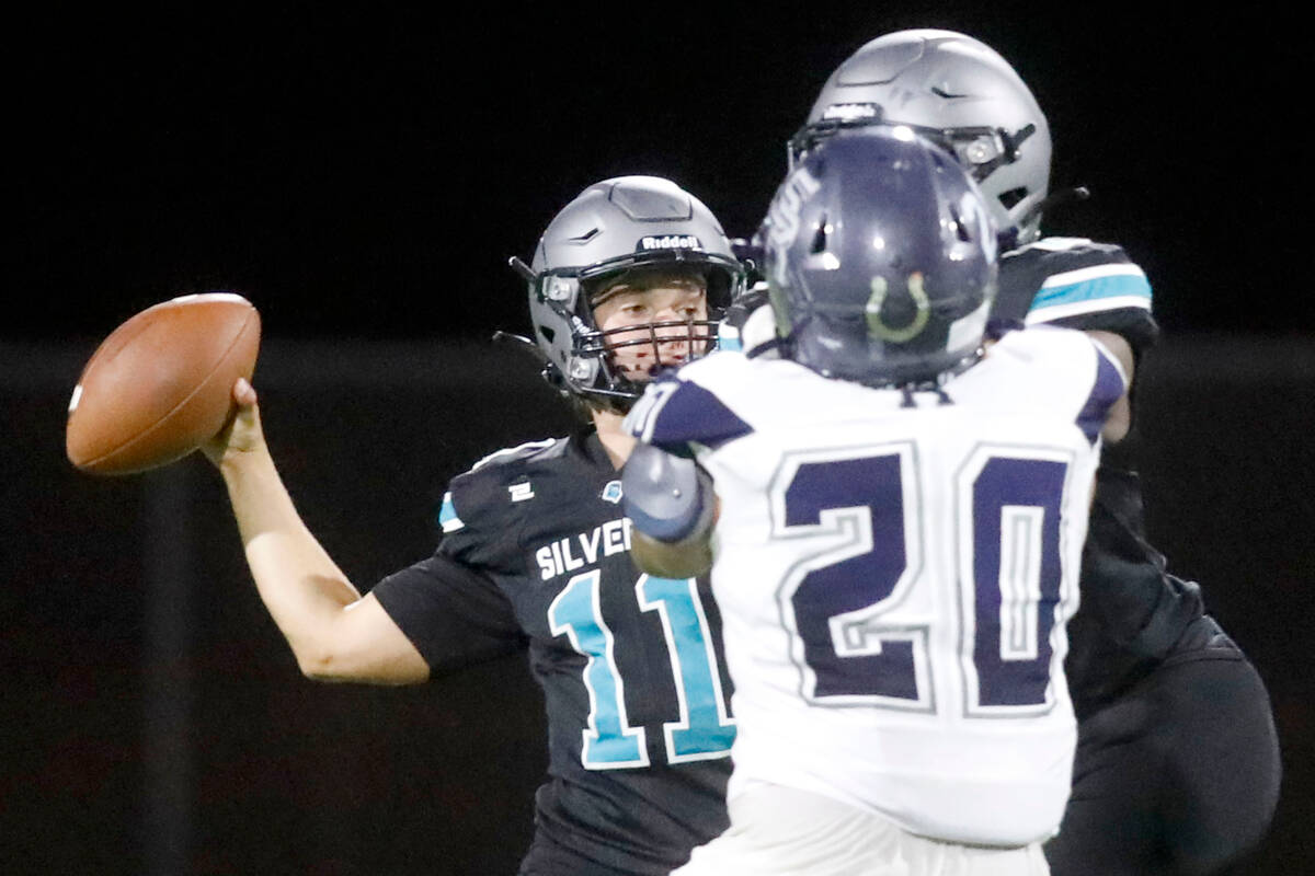Silverado High School quarterback Brandon Tunnell (11) throws a pass during the second half of ...