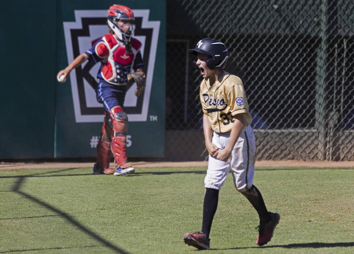 Paseo Verde's shortstop Ryland Gregorich (33) reacts after scoring against Utah-Snow Canyon in ...