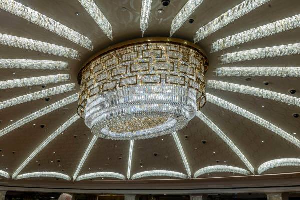 Caesars unveils its renovated casino dome with chandelier centerpiece within a main gaming area ...