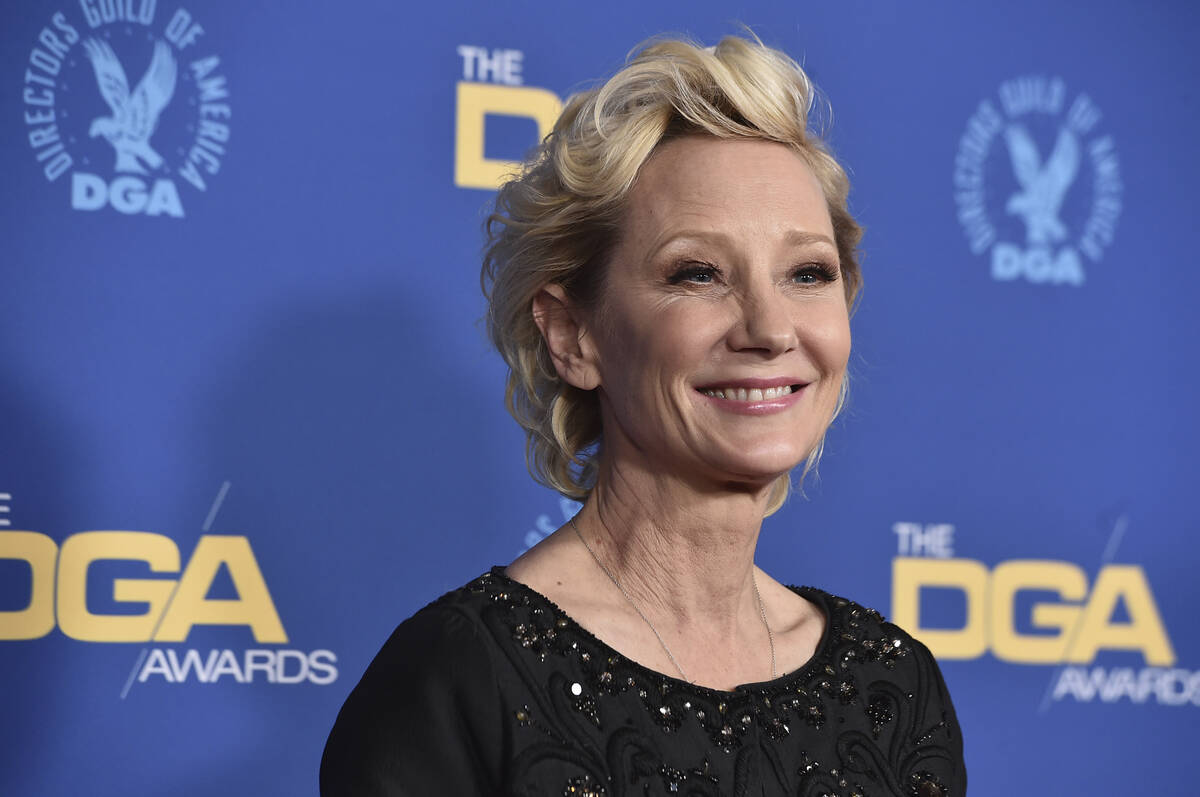 FILE - Anne Heche arrives at the 74th annual Directors Guild of America Awards on March 12, 202 ...