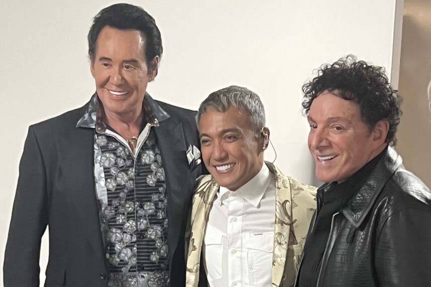 Wayne Newton, Arnel Pineda and Neal Schon are shown backstage before Journey's performance at R ...