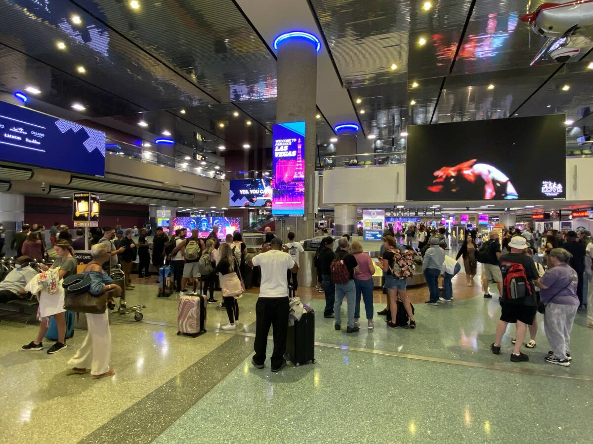 Travelers are held up at Harry Reid International Airport in Las Vegas Nevada on August 14, 2022.