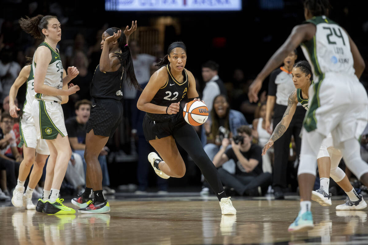 Las Vegas Aces forward A'ja Wilson (22) brings the ball up the court as the Aces face the Seatt ...