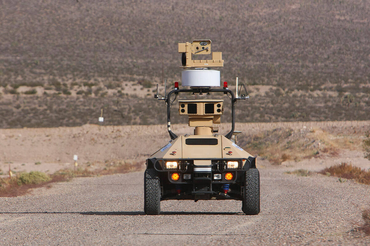 A Mobile Detection Assessment Response System (MDARS) robotic vehicle patrols an area of the Ne ...