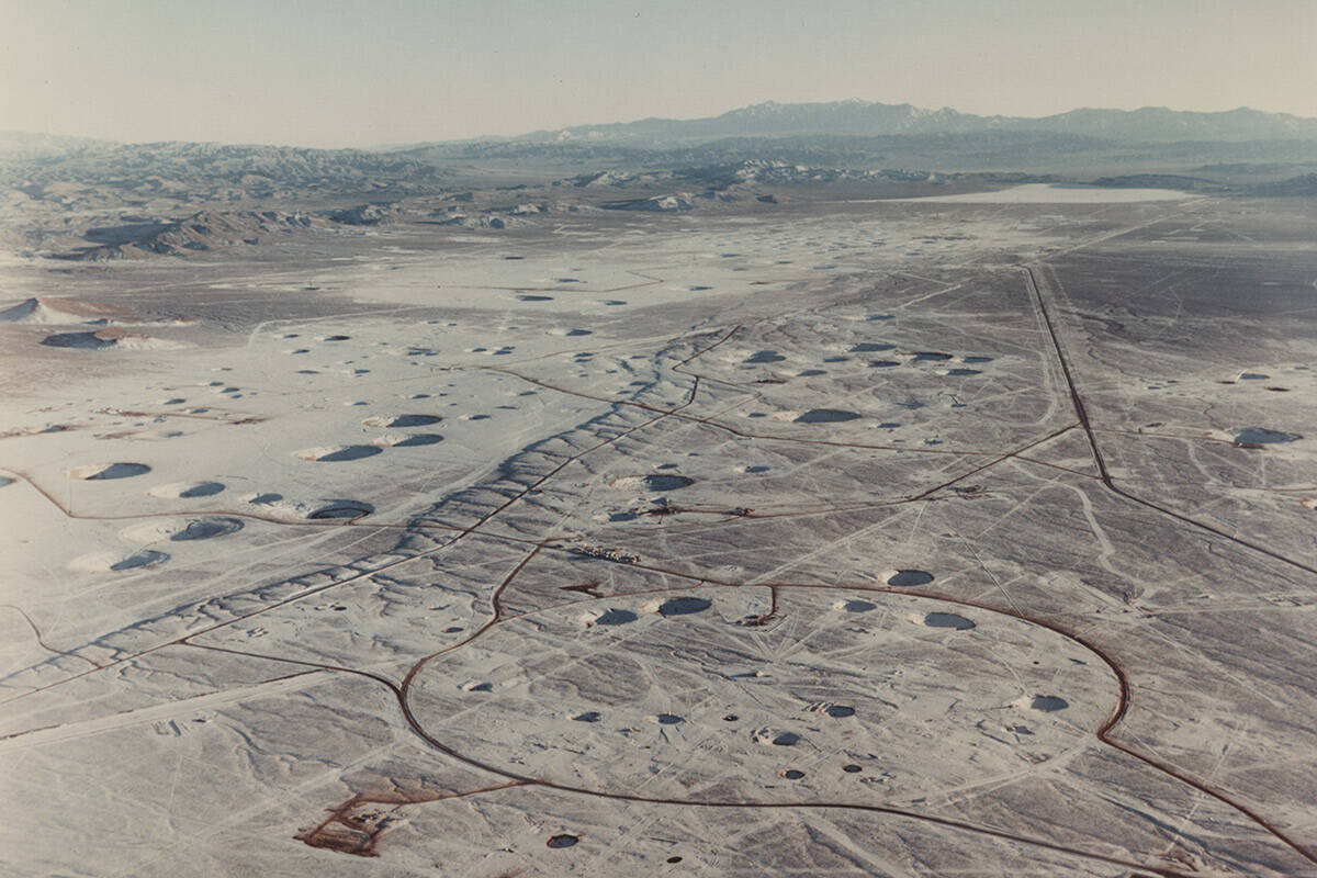 View of the north end of Yucca Flat at the Nevada Test Site. Saucer-shaped craters of varying s ...