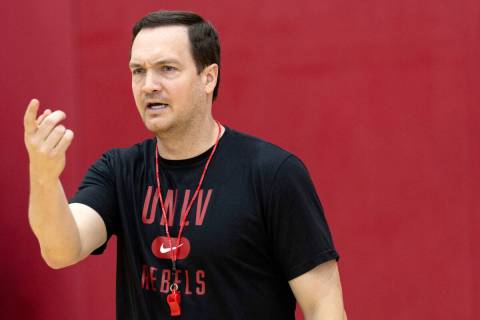UNLV Rebels head coach Kevin Kruger signals from the sidelines during UNLV men's basketball&#x2 ...