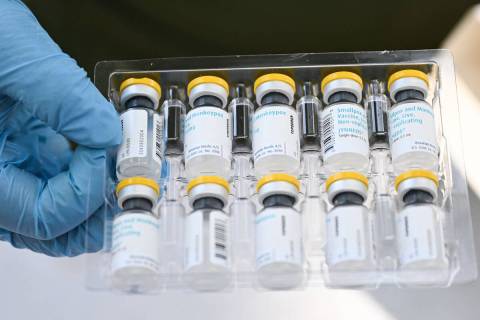 Vials of the JYNNEOS Monkeypox vaccine are prepared at a pop-up vaccination clinic in Los Angel ...