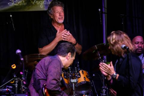 Drummer Johnny Friday of the Santa Fe & The Fat City Horns is acknowledged during a perform ...
