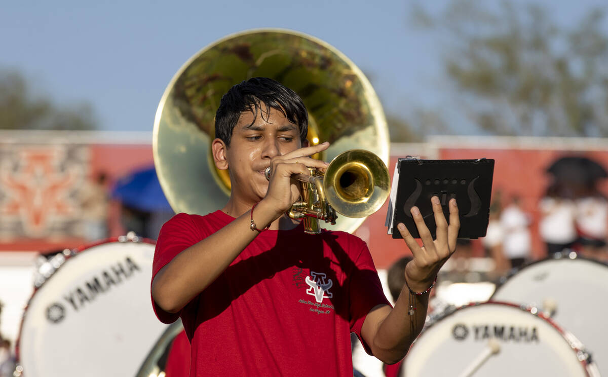 The Arbor View High School marching band performs the Star Spangled Banner before Arbor View ho ...