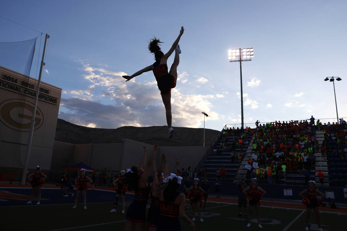 Cheerleaders perform before the start of a football game between Bishop Gorman and Corner Canyo ...