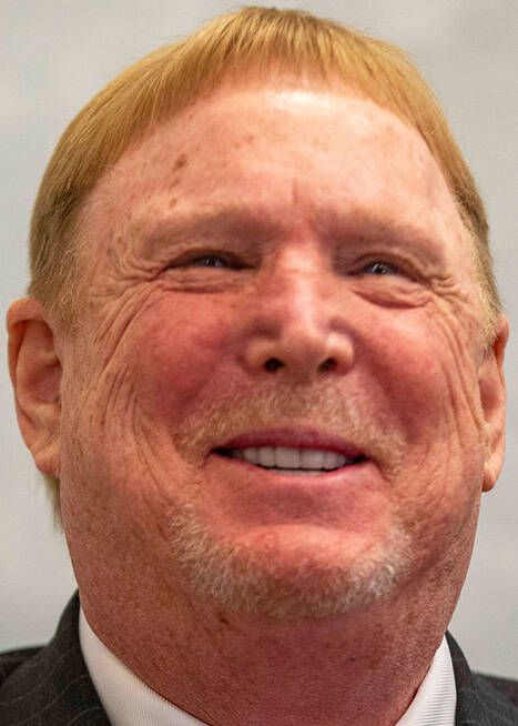 Raiders owner Mark Davis smiles during an interview after an NFL meeting where the team owners ...