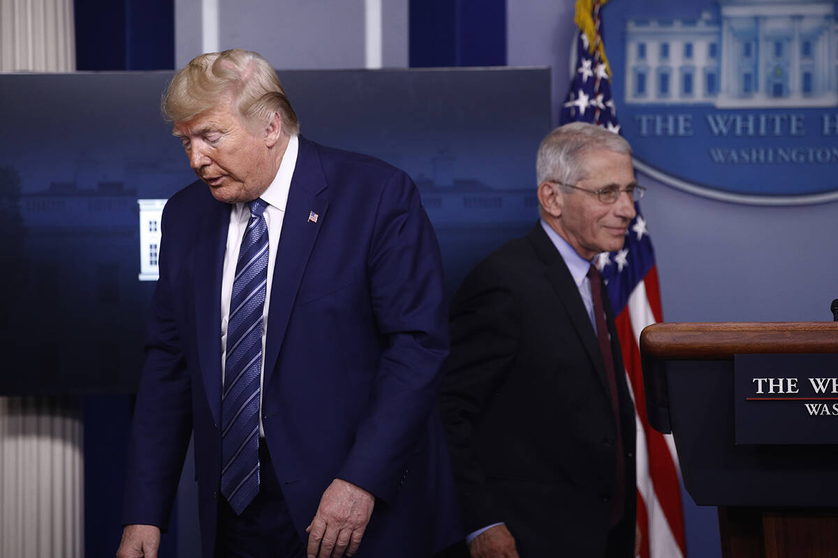 Director of the National Institute of Allergy and Infectious Diseases Dr. Anthony Fauci, right, ...