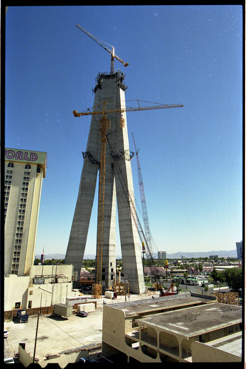 A giant crane next to the Stratosphere Tower that is building itself by inserting 20 foot secti ...