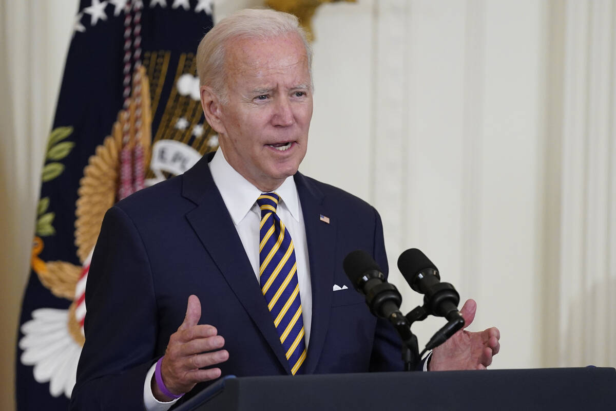 FILE - President Joe Biden in the East Room of the White House, Aug. 10, 2022, in Washington. ...