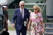 FILE - President Joe Biden and first lady Jill Biden exit Marine One at Charleston Executive Ai ...