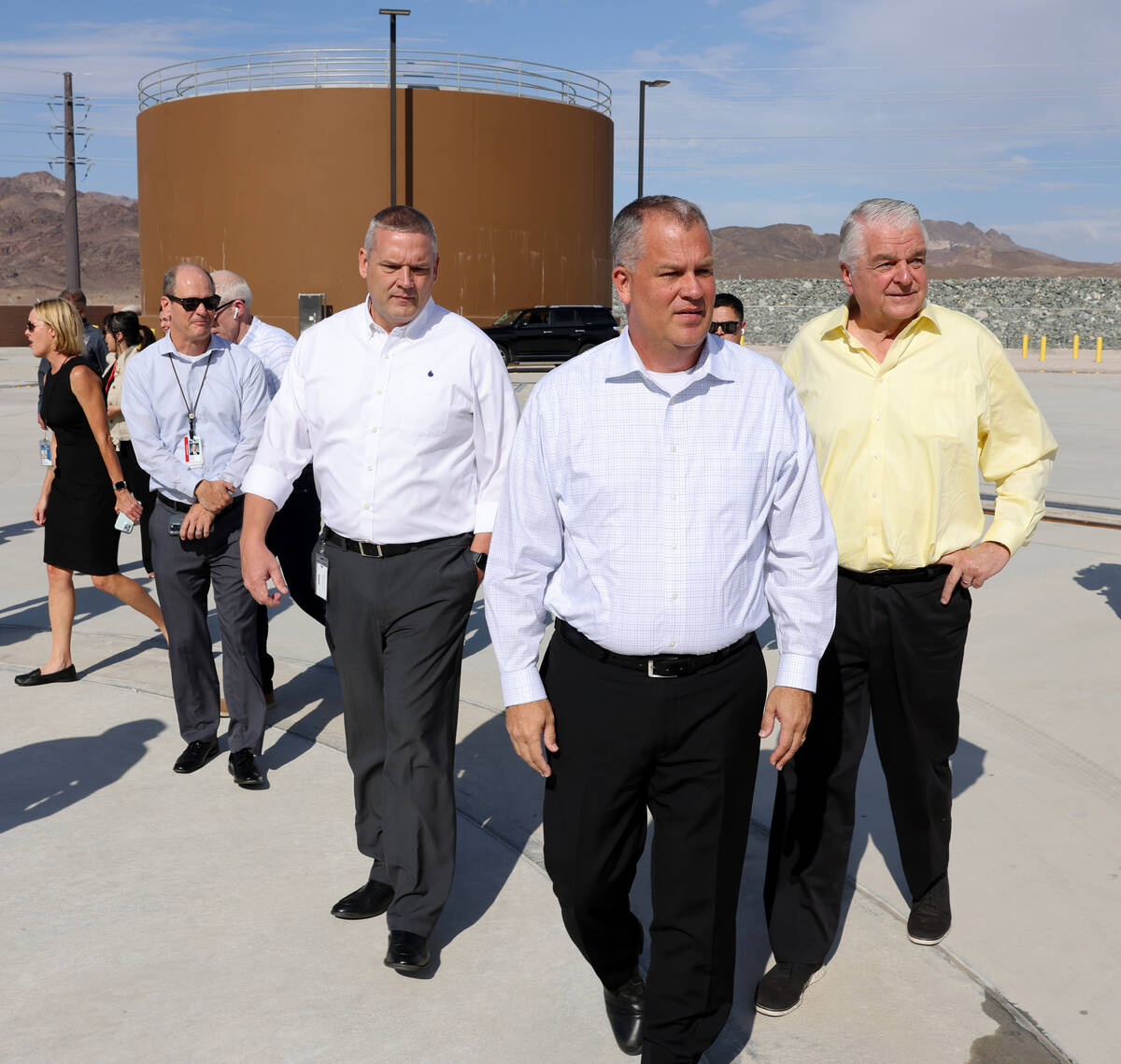 Nevada Gov. Steve Sisolak, right, tours the Southern Nevada Water Authority new low-lake-level ...
