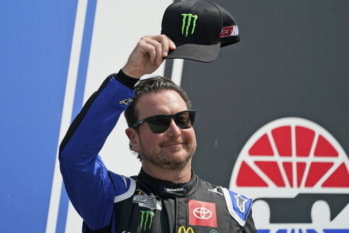 FILE - NASCAR Cup Series driver Kurt Busch tips his cap prior to the NASCAR Cup Series auto rac ...