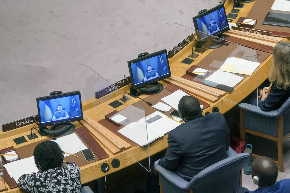 FILE - Ukrainian President Volodymyr Zelenskyy addresses the Security Council via video link du ...