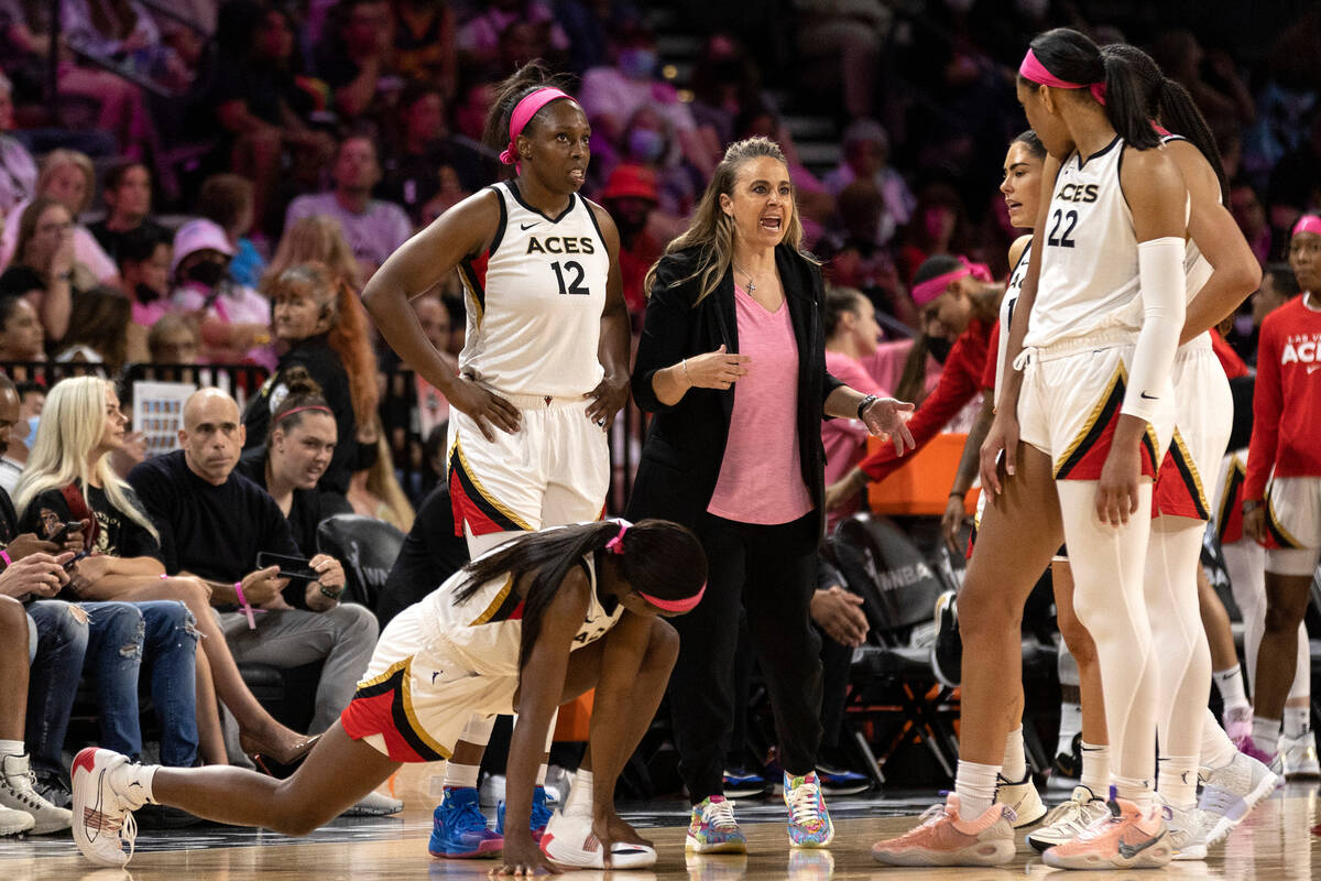 Las Vegas Aces head coach Becky Hammon speaks to her team in a timeout during the second half o ...