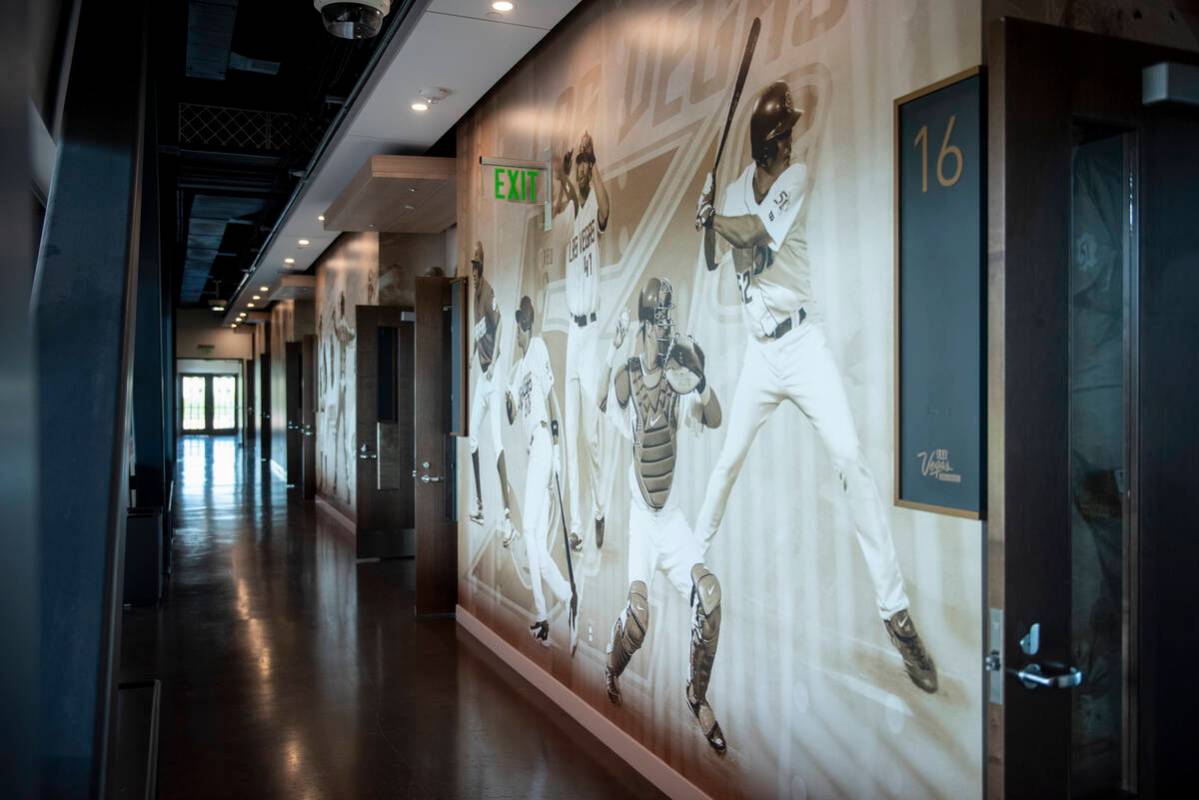 A mural showcasing the history of minor league baseball in Las Vegas is behind the box suites a ...