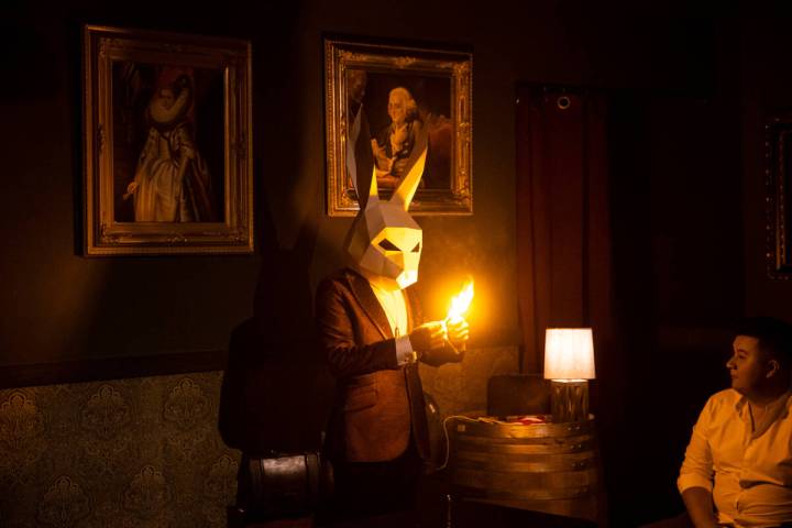 The Magician of The Magician's Study performs a trick during his second show of the night on Sa ...