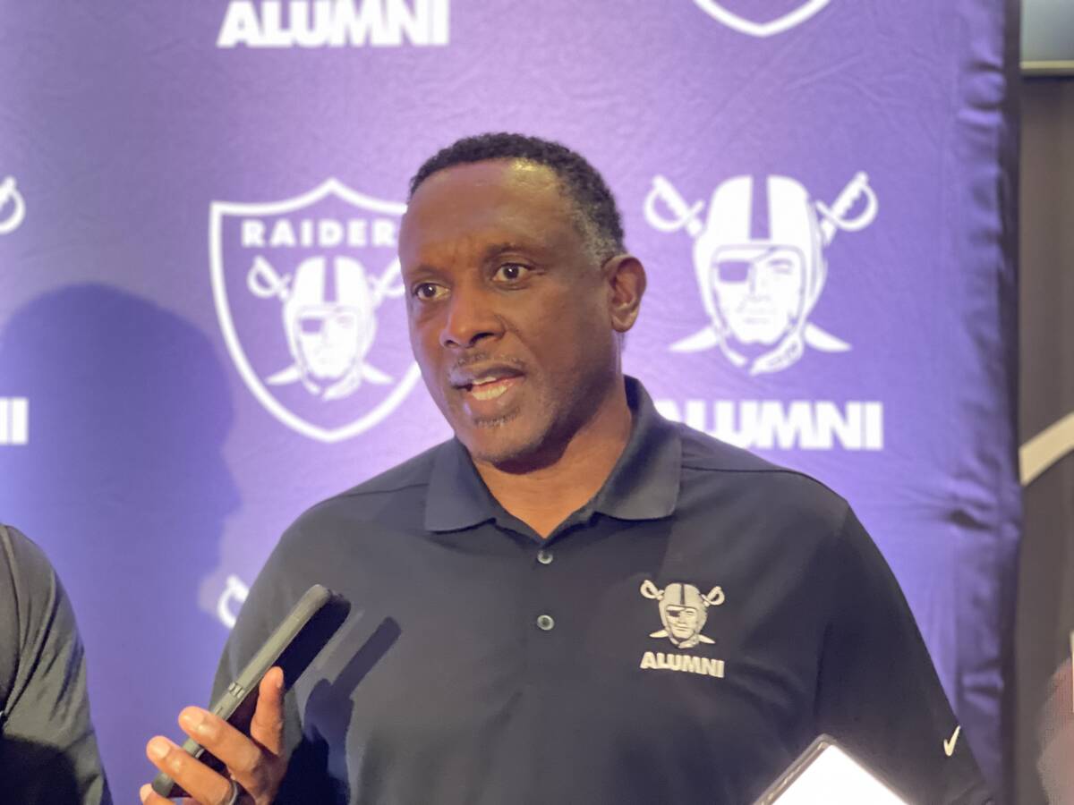 Hall of Fame Raiders receiver Tim Brown talks to media during a gathering of Raider alumni at W ...