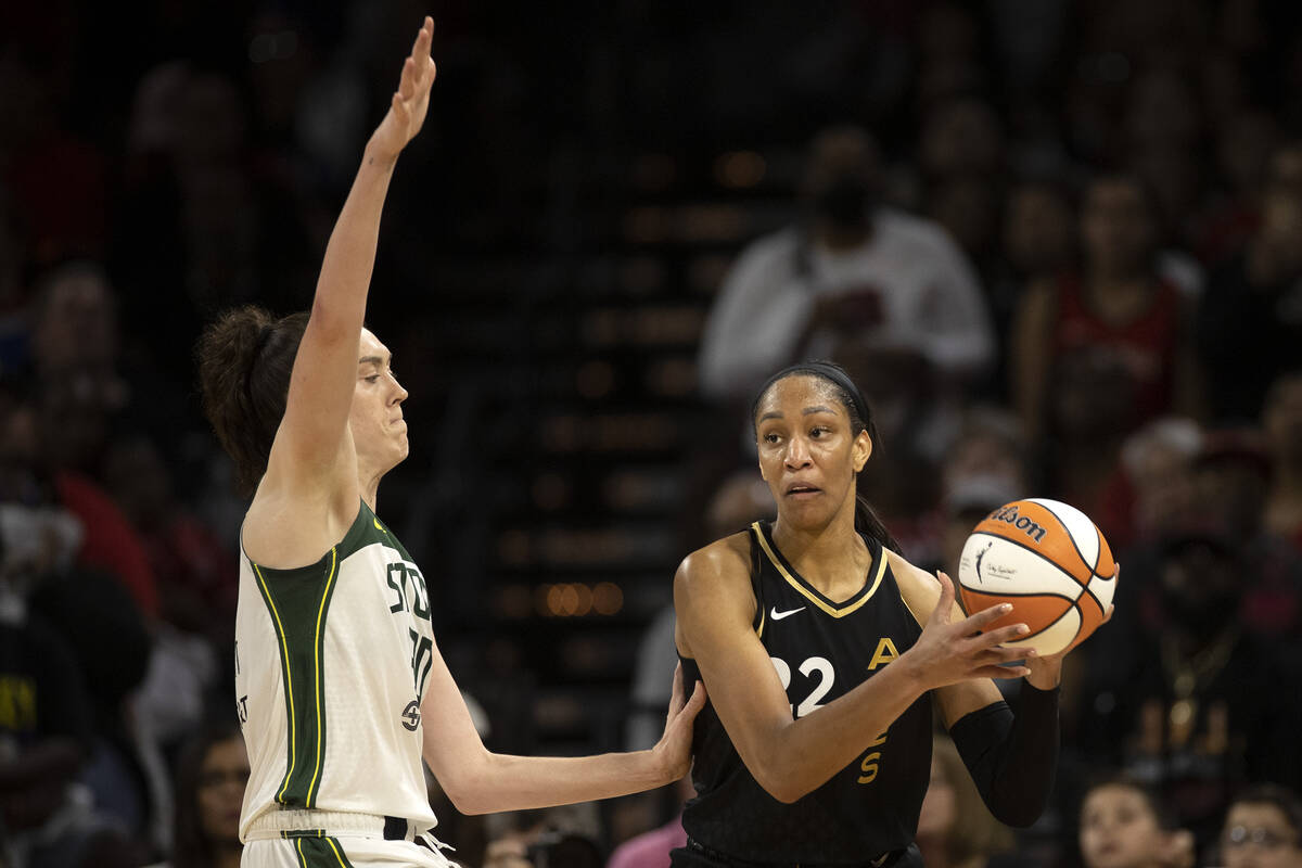 Las Vegas Aces forward A'ja Wilson (22) looks to pass while Seattle Storm forward Breanna Stewa ...