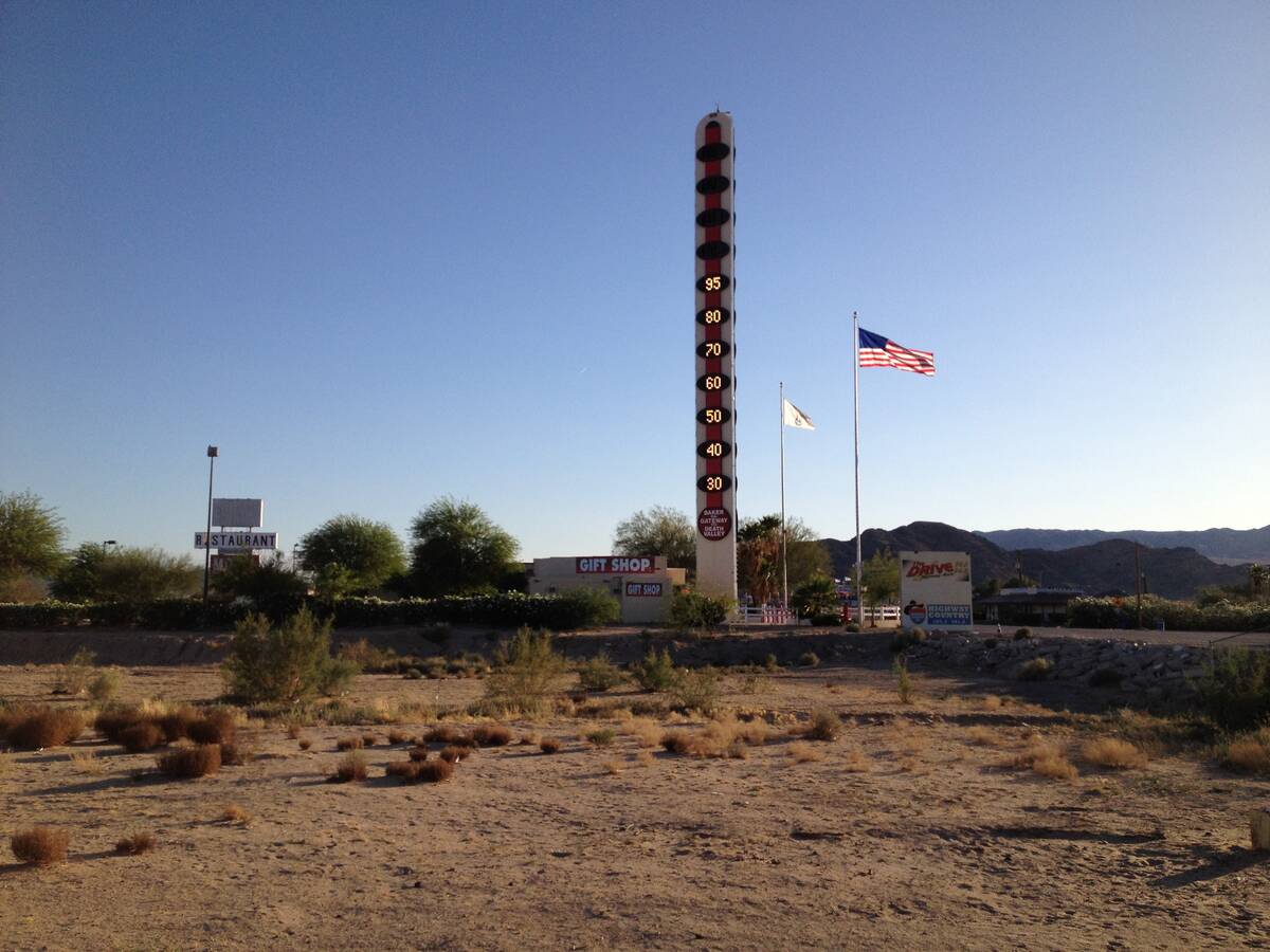 1. The world's tallest thermometer in Baker, Calif., reads 95 degrees as drivers make their way ...