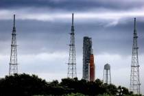 Storm clouds linger over Artemis I, NASA's Space Launch System heavy-lift rocket carrying the O ...