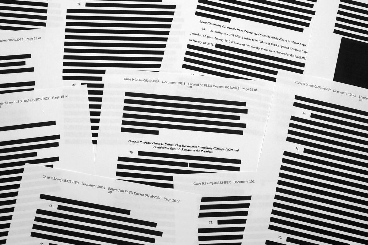 Pages from the affidavit by the FBI in support of obtaining a search warrant for former Preside ...