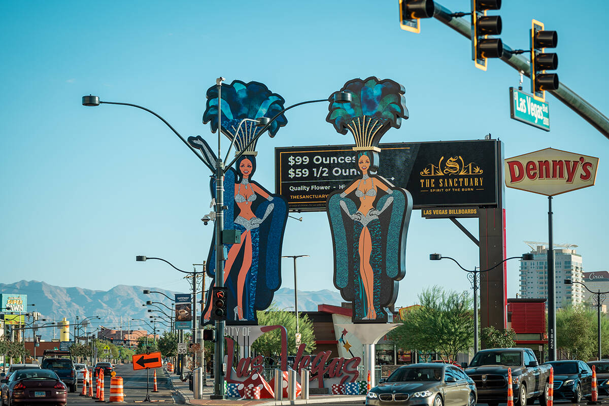 Two brand-new, 50-foot-tall showgirls have been installed on the corner of Main Street and Las ...