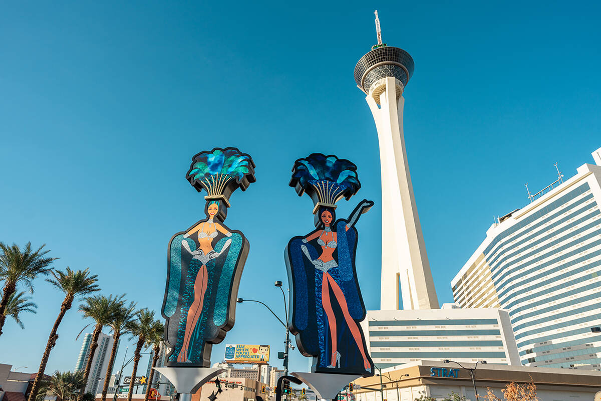 The previously installed, 25-foot-tall showgirl signs that were near the Strat, shown here, ar ...