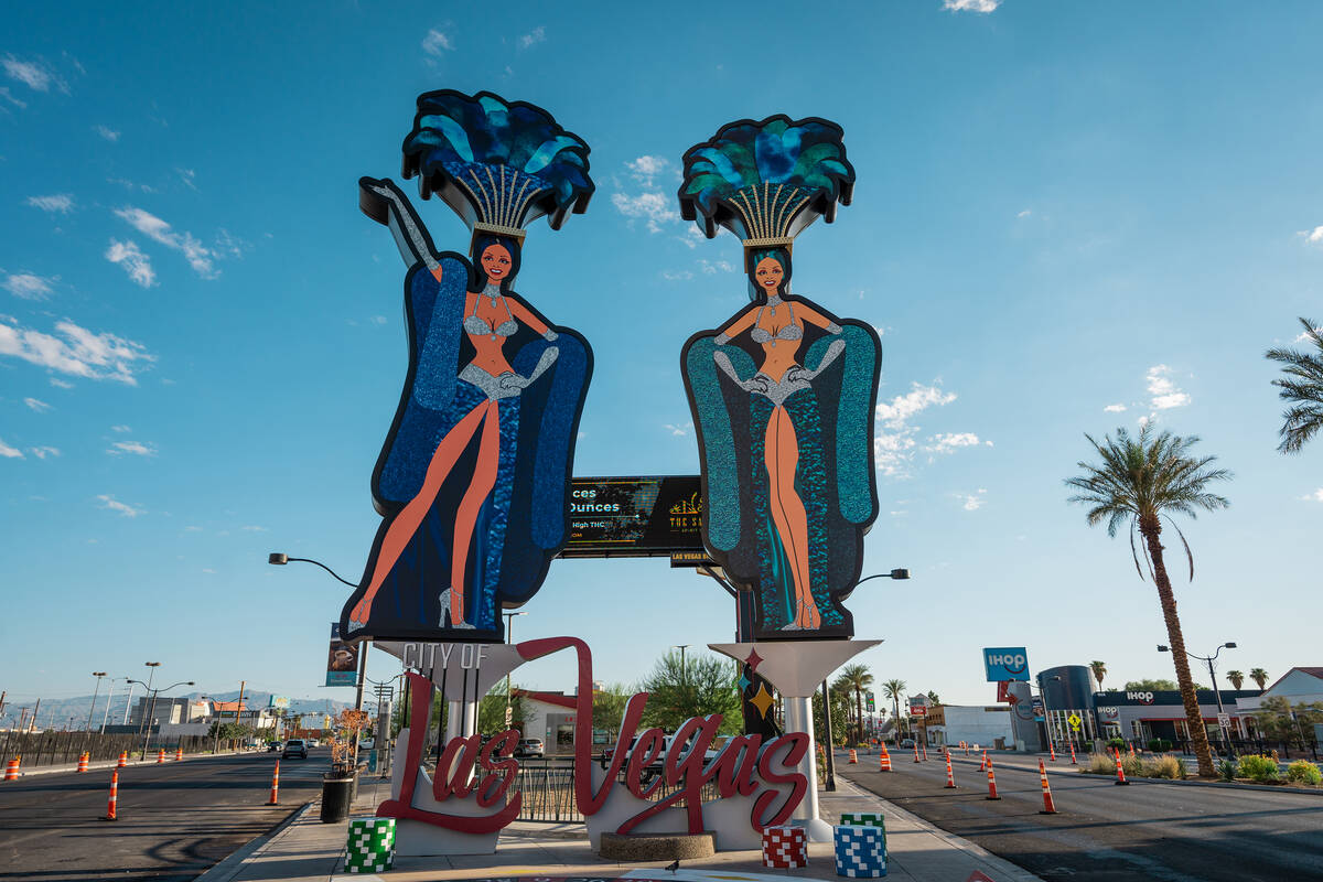 Two brand-new, 50-foot-tall showgirls have been installed on the corner of Main Street and Las ...