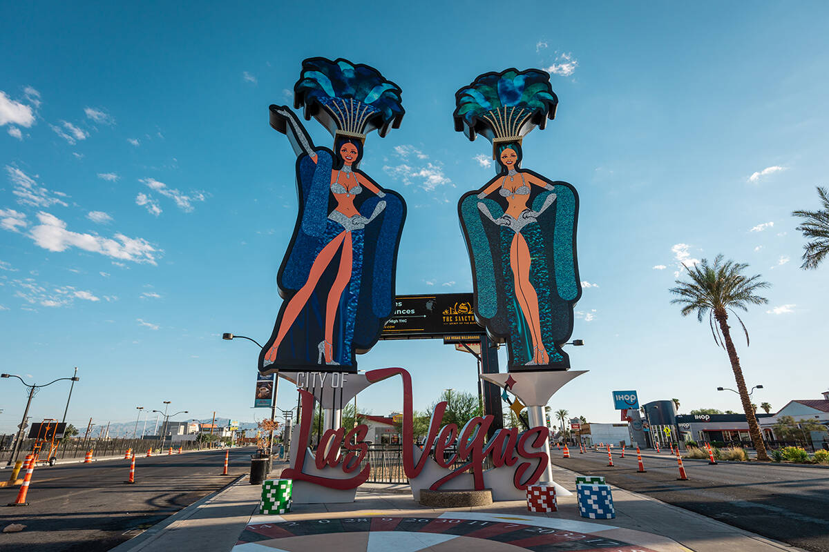 Two brand-new, 50-foot-tall showgirls have been installed on the corner of Main Street and Las ...