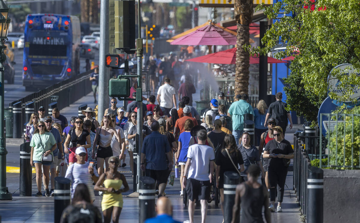 Visitors take to the Las Vegas Strip as Labor Day weekend approaches on Wednesday, Aug. 31, 202 ...