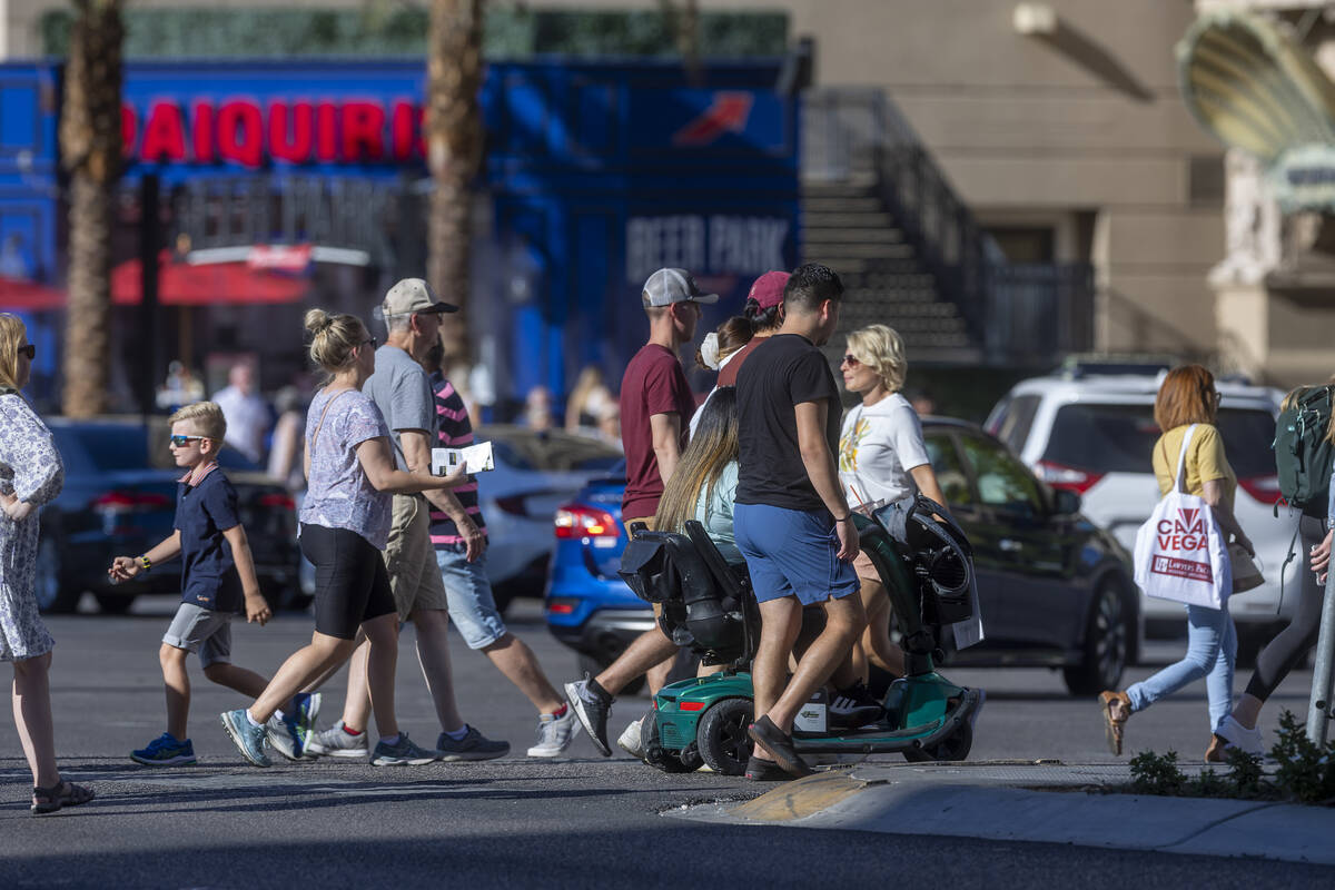 Visitors take to the Las Vegas Strip as Labor Day weekend approaches on Wednesday, Aug. 31, 202 ...