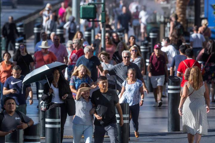 Visitors take to the Las Vegas Strip as Labor Day weekend approaches on Wednesday, Aug. 31, 202 ...