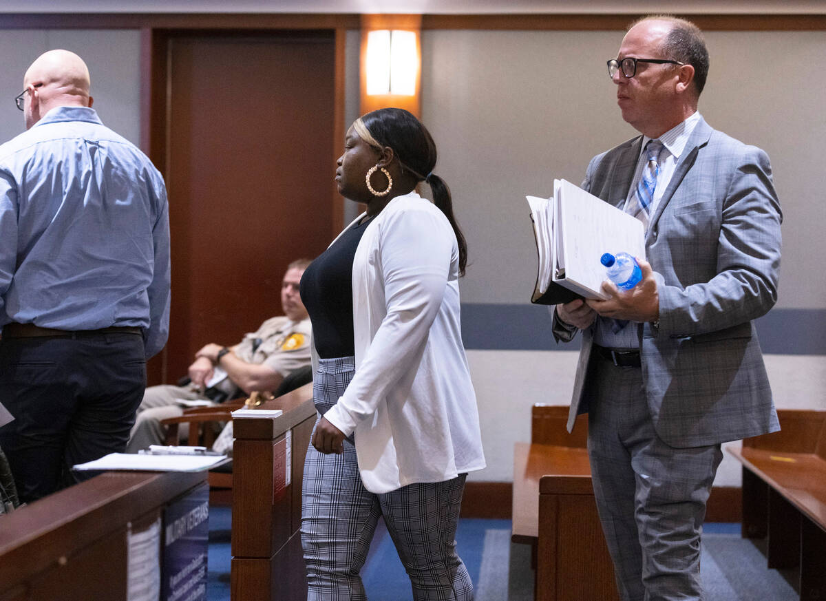 Jaquitta Madison appears in court with her attorney, Philip Singer, right, during her prelimina ...