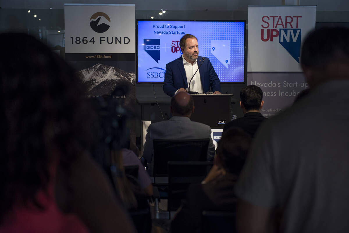 Nevada Treasurer Zach Conine speaks at a press conference to announce a new program that will p ...