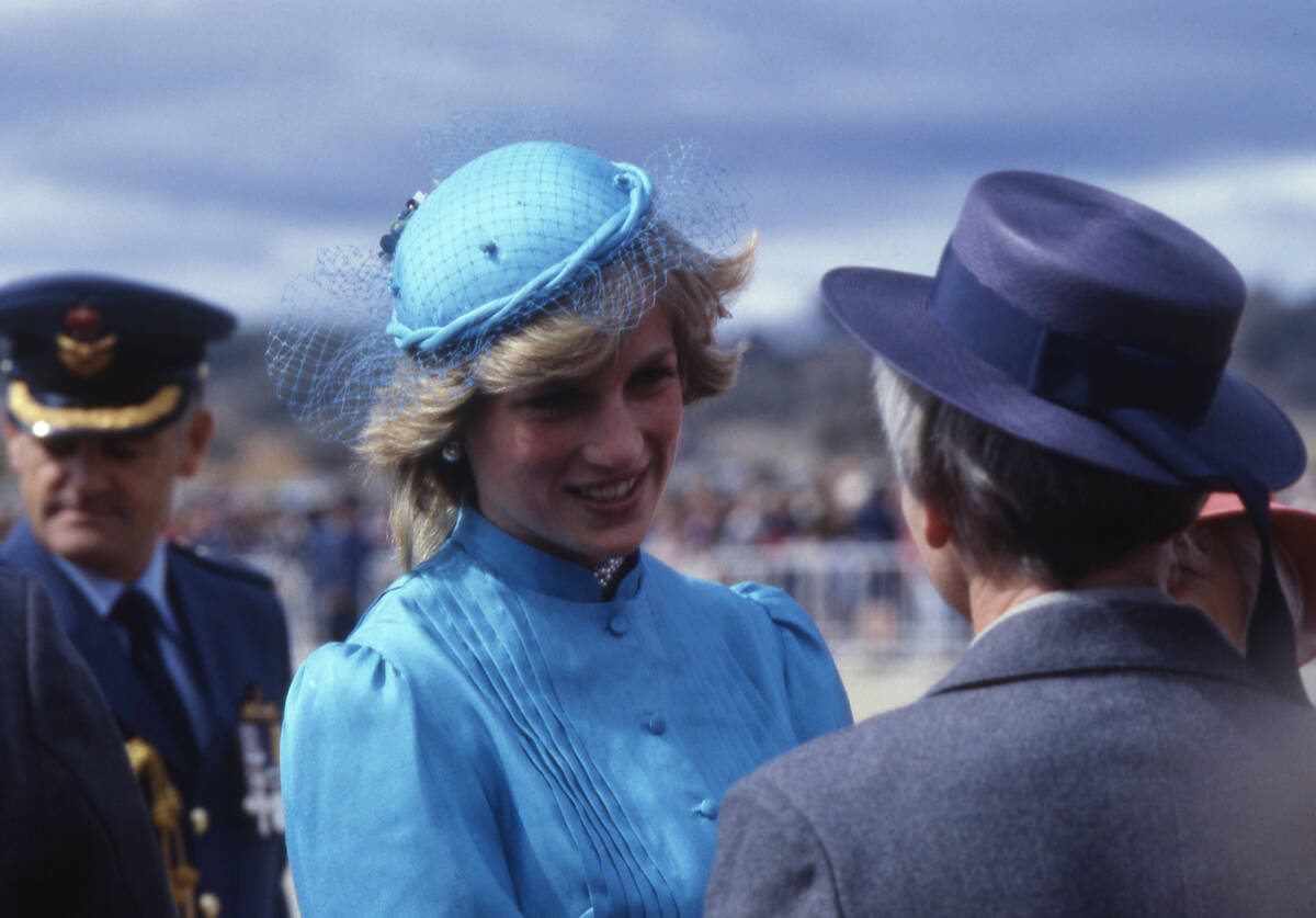 Britain's Princess Diana, with her husband Prince Charles, unseen, after their arrival at Canbe ...