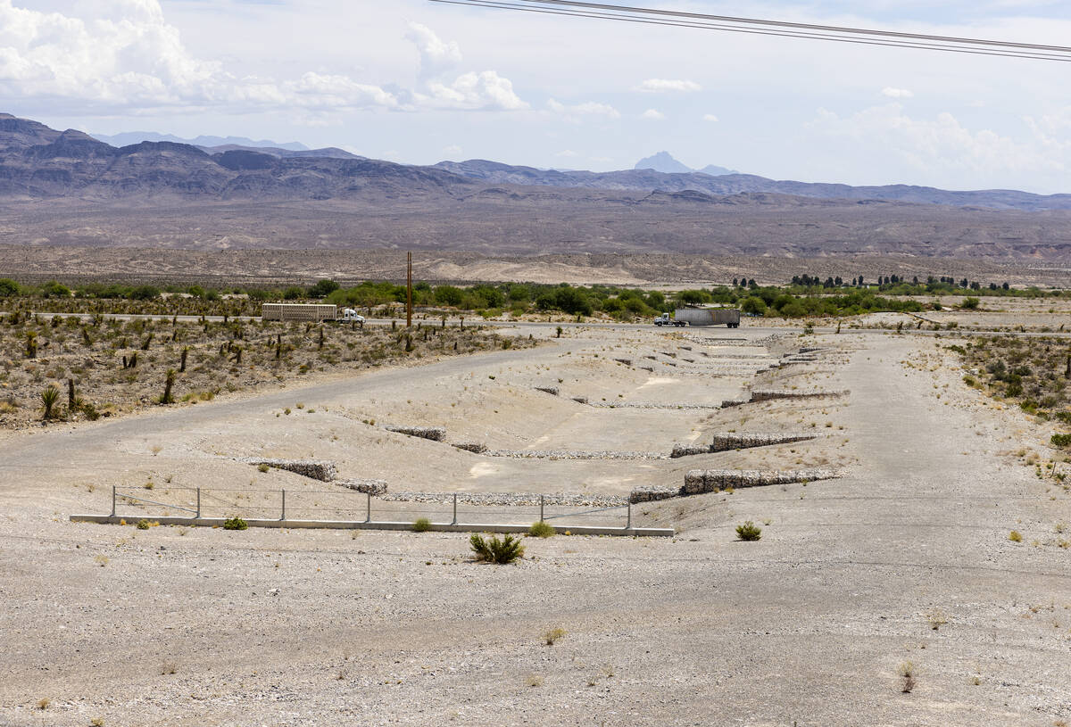 Flood control channel at Coyote Springs water detention basin are seen near Coyote Springs Golf ...