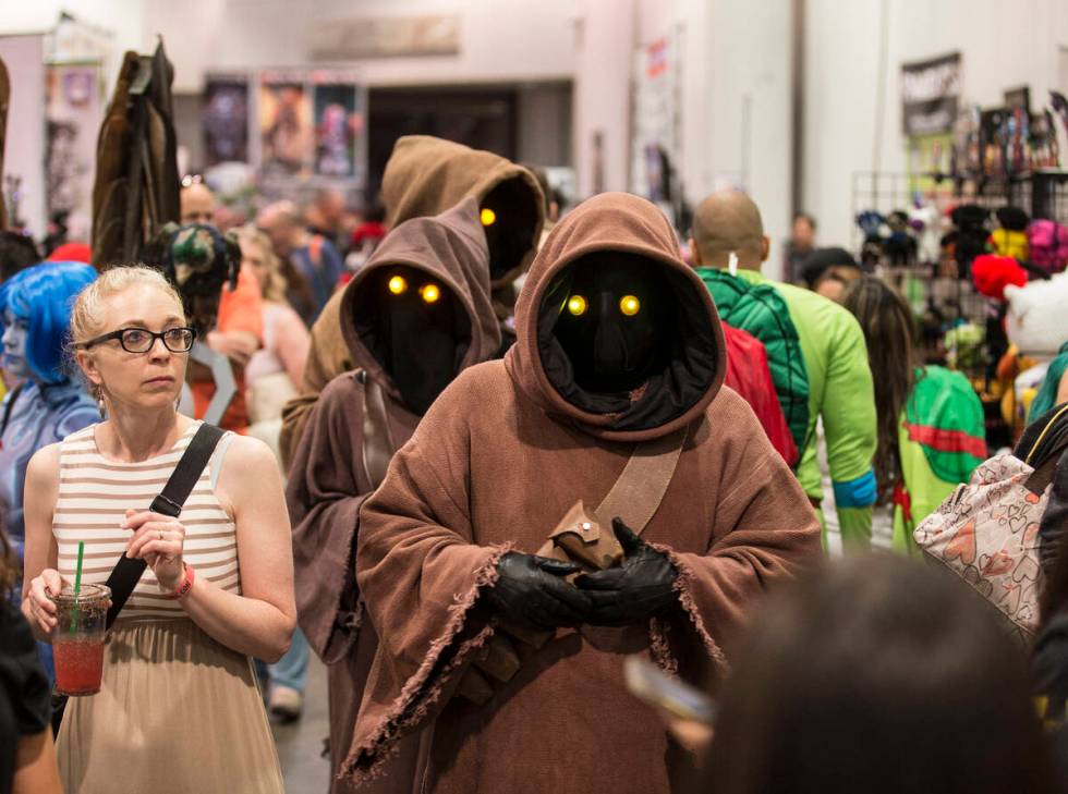 Characters inspired by the " Star Wars" series walk the North Halls during the Amazin ...