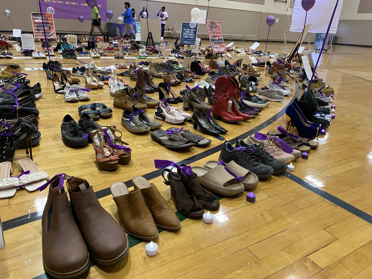 Dozens of shoes were laid out inside the Chuck Minker Sports Complex on Wednesday, Aug. 31, 202 ...