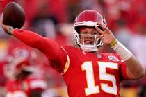 Kansas City Chiefs quarterback Patrick Mahomes throws during warmups before a preseason NFL foo ...