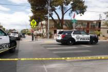 Las Vegas police investigate around the 4100 block of Pennwood Avenue, Tuesday, Aug. 9, 2022, i ...